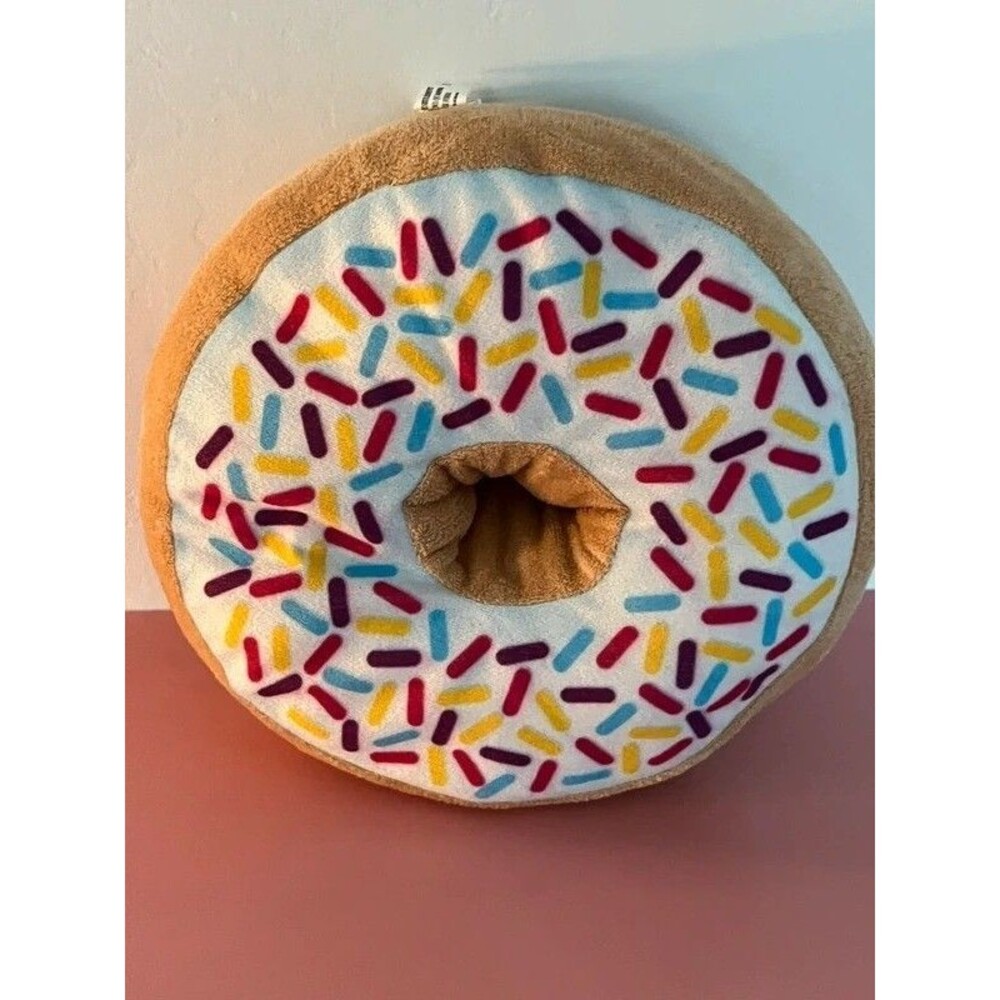 plush donut-shaped throw pillow